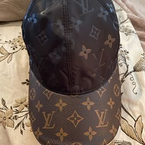 Louis Vuitton monogram & black hat.